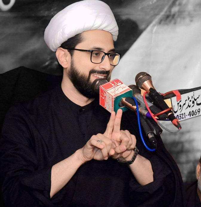 Maulana Taqi Mehdavi honouring the standard of Karbala during Muharram